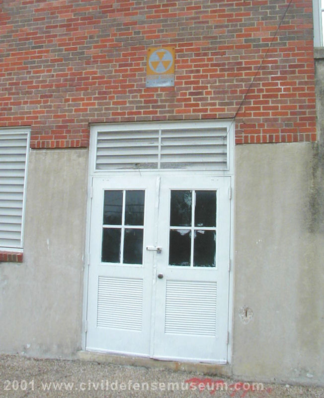 Basement Door With Shelter Sign