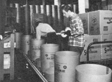 Workshops For The Blind Workers Loading Sanitation Kit Drums